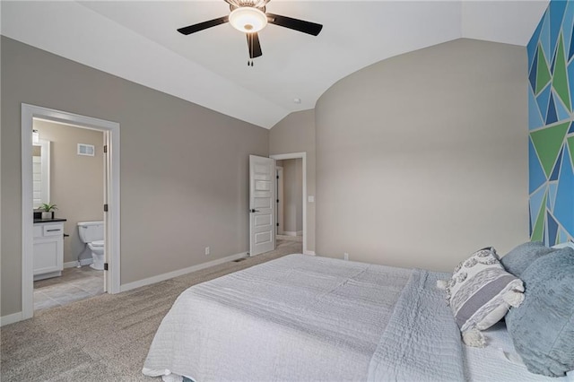9238 Marion St, Lenexa, KS 66220 - bedroom with lofted ceiling, light colored carpet, connected bathroom, ceiling fan, and baseboards