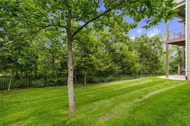 9238 Marion St, Lenexa, KS 66220 - view of yard featuring a patio and view of wooded area