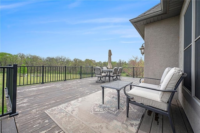 15511 Salem Rd, Excelsior Springs, MO 64024 - wooden terrace with outdoor dining area