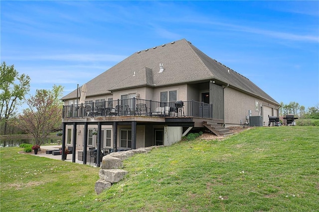 15511 Salem Rd, Excelsior Springs, MO 64024 - back of property featuring a wooden deck, cooling unit, a yard, and a patio area