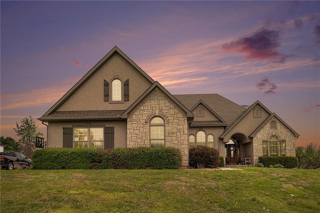 15511 Salem Rd, Excelsior Springs, MO 64024 - view of front of house featuring stone siding, stucco siding, and a front yard