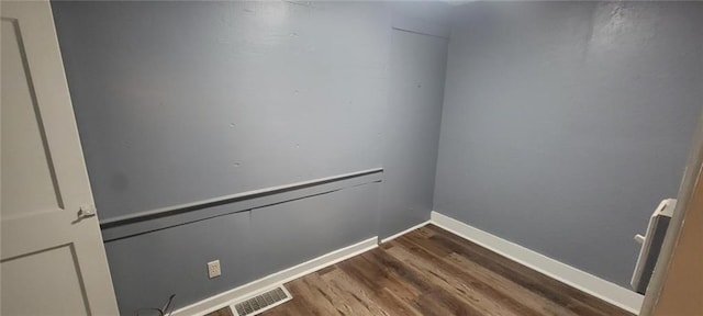 224 Spruce St, Leavenworth, KS 66048 - interior space with visible vents, baseboards, and wood finished floors
