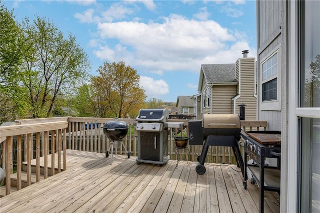wooden deck with area for grilling