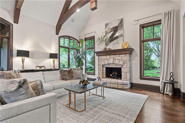 10408 Howe Ln, Leawood, KS 66206 - living room with a stone fireplace, wood finished floors, high vaulted ceiling, baseboards, and beamed ceiling