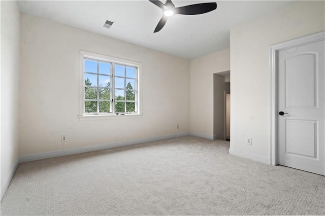 10408 Howe Ln, Leawood, KS 66206 - unfurnished bedroom with baseboards, carpet, a ceiling fan, and visible vents