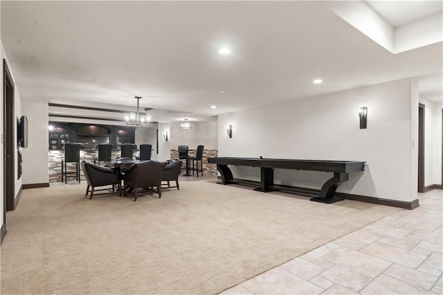 10408 Howe Ln, Leawood, KS 66206 - dining area featuring an inviting chandelier, baseboards, recessed lighting, and stone tile floors