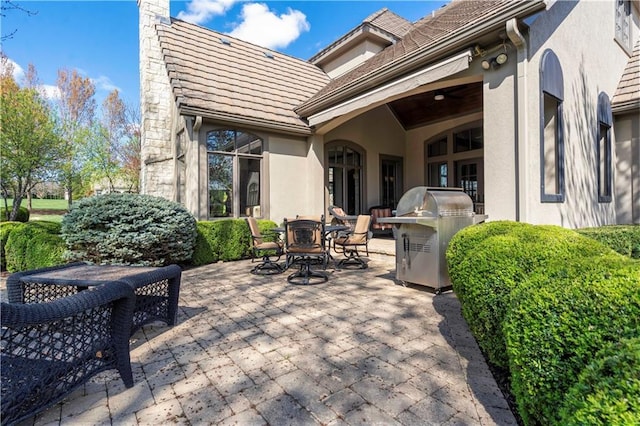 10408 Howe Ln, Leawood, KS 66206 - view of patio with outdoor dining space and area for grilling