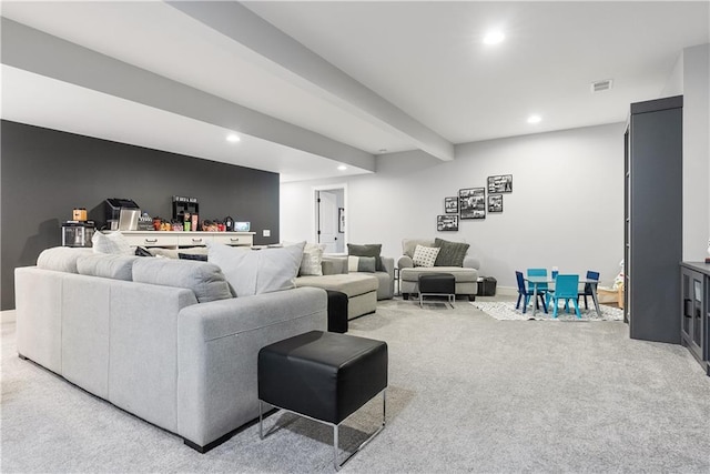 living room with visible vents, light carpet, beam ceiling, recessed lighting, and baseboards