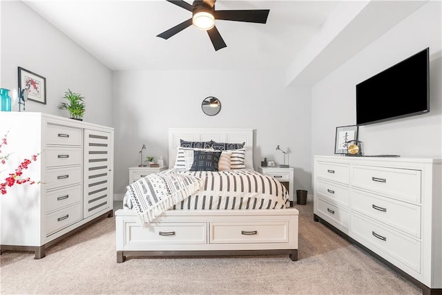 bedroom with light colored carpet and ceiling fan