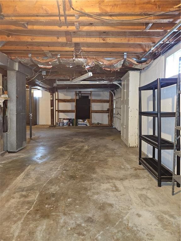 basement featuring heating unit