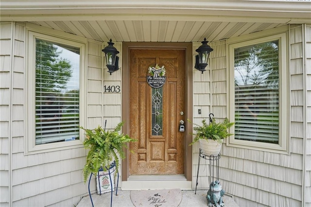 doorway to property featuring a porch