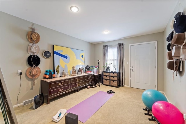 workout area featuring baseboards, carpet flooring, recessed lighting, and visible vents