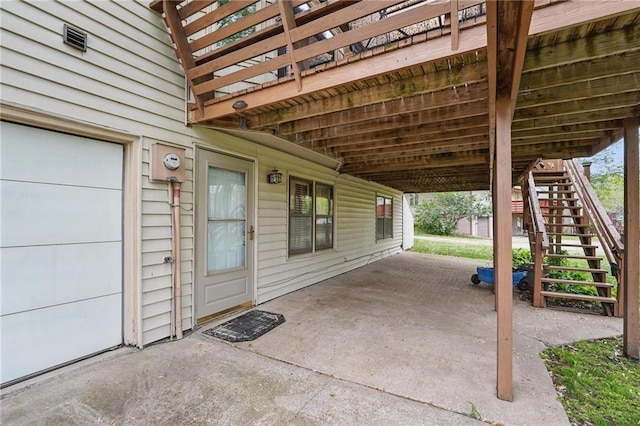 view of patio with stairway