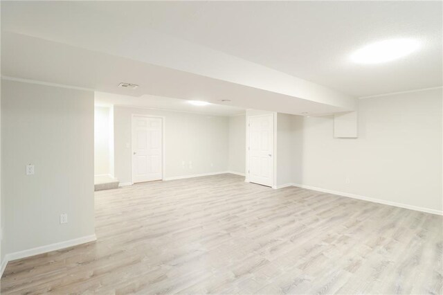 4373 Hackberry Ln, Bates City, MO 64011 - finished basement with light wood finished floors and baseboards