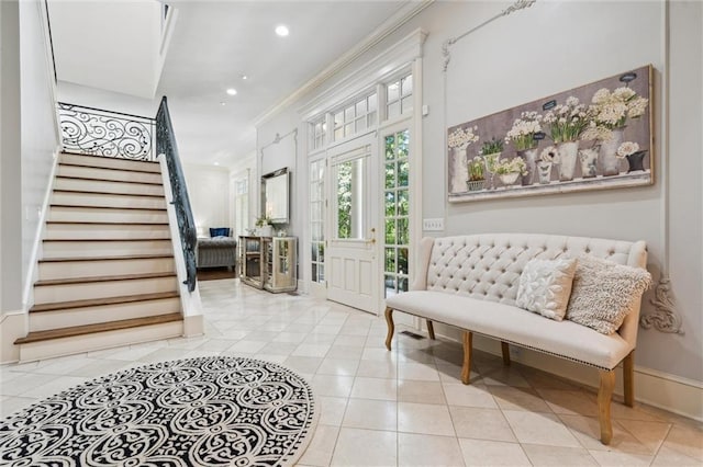 entrance foyer featuring light tile patterned flooring, stairs, recessed lighting, baseboards, and ornamental molding
