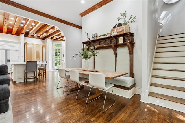 dining area featuring recessed lighting, ornamental molding, dark wood-style floors, and stairway