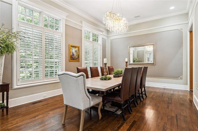 dining area with an inviting chandelier, baseboards, crown molding, and dark wood-style floors