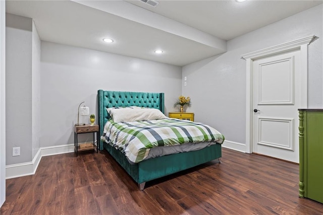 bedroom featuring recessed lighting, baseboards, and wood finished floors