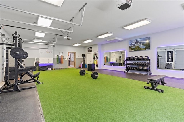 workout area featuring carpet