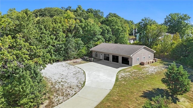 aerial view with a wooded view