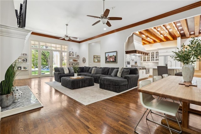 living room featuring recessed lighting, ornamental molding, dark wood finished floors, and ceiling fan