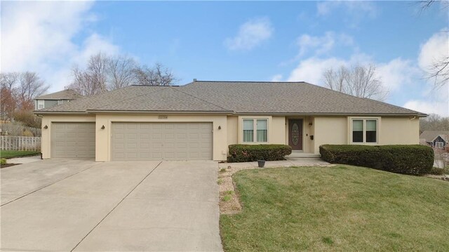 22804 E 28th Terrace Ct, Blue Springs, MO 64015 - view of front facade with driveway, a garage, stucco siding, and roof with shingles