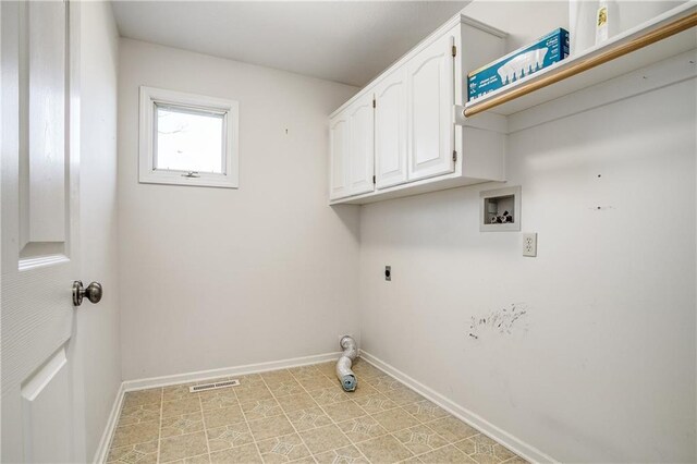 22804 E 28th Terrace Ct, Blue Springs, MO 64015 - washroom with hookup for an electric dryer, hookup for a washing machine, baseboards, and cabinet space
