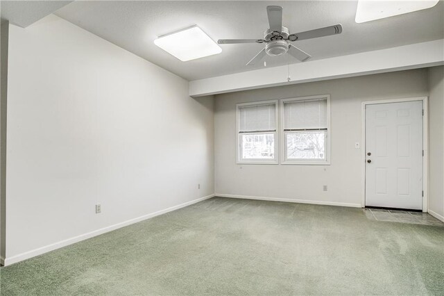 22804 E 28th Terrace Ct, Blue Springs, MO 64015 - carpeted spare room with a ceiling fan and baseboards