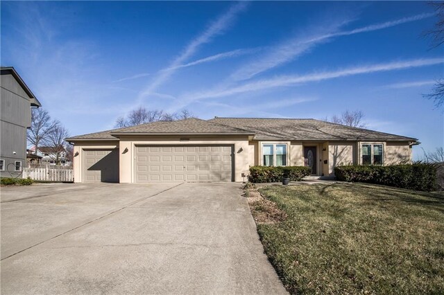 22804 E 28th Terrace Ct, Blue Springs, MO 64015 - ranch-style house with a garage, driveway, stucco siding, and a shingled roof