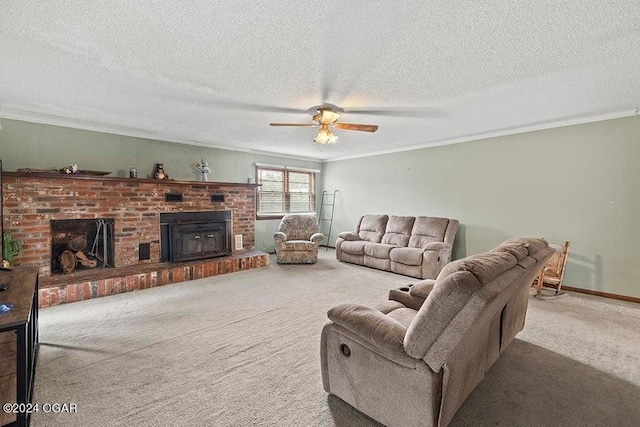 104 W Highland Ave, Nevada, MO 64772 - carpeted living area featuring ornamental molding, ceiling fan, a brick fireplace, and a textured ceiling