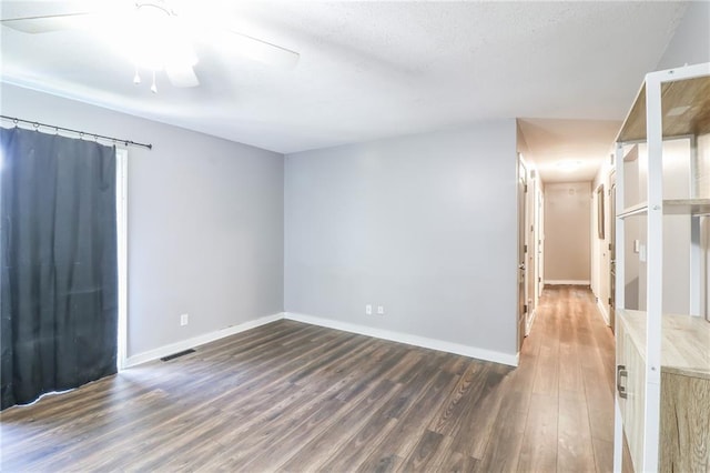 308 Acorn Pl, Warrensburg, MO 64093 - empty room featuring wood finished floors and a ceiling fan