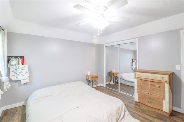 308 Acorn Pl, Warrensburg, MO 64093 - bedroom with a closet, dark wood-style floors, and ceiling fan