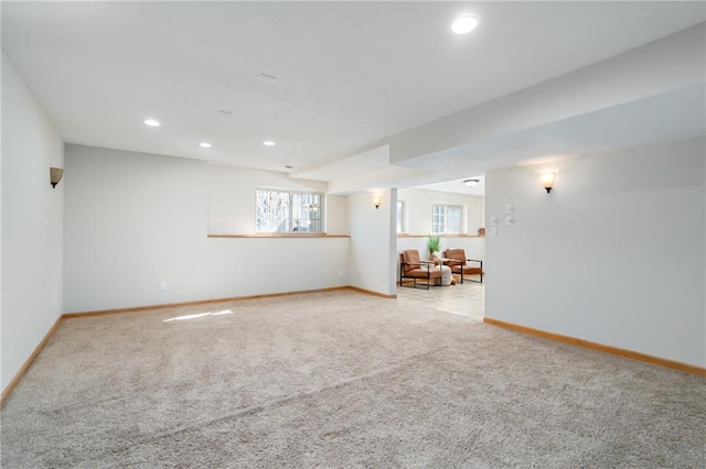 carpeted spare room with recessed lighting and baseboards