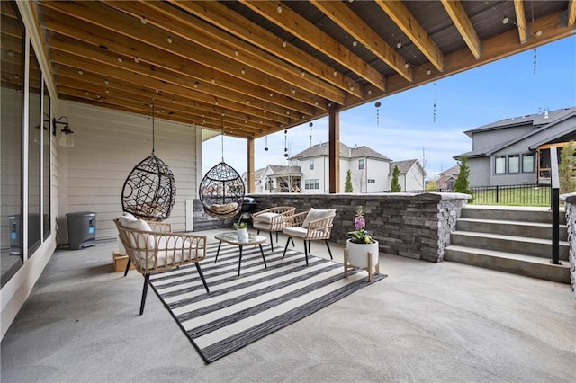 12313 W 169th St, Overland Park, KS 66221 - view of patio with an outdoor living space and a residential view