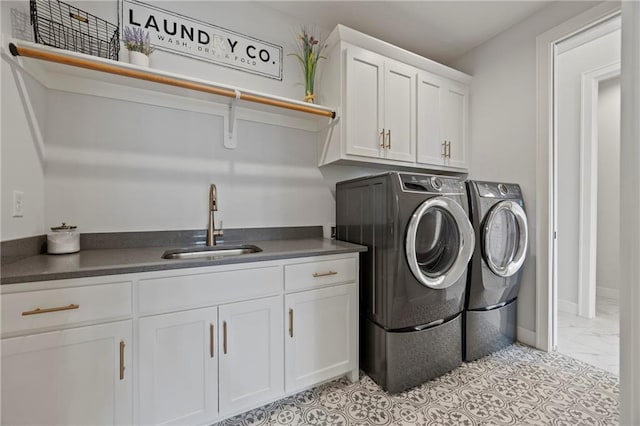 12313 W 169th St, Overland Park, KS 66221 - laundry room featuring independent washer and dryer, cabinet space, and light marble finish floors