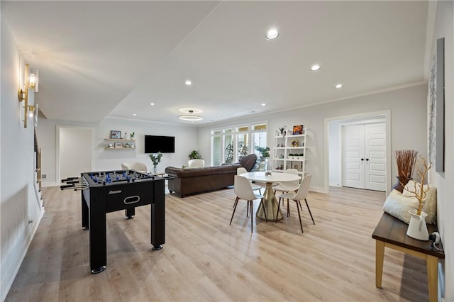 12313 W 169th St, Overland Park, KS 66221 - recreation room featuring crown molding, recessed lighting, and light wood-style flooring