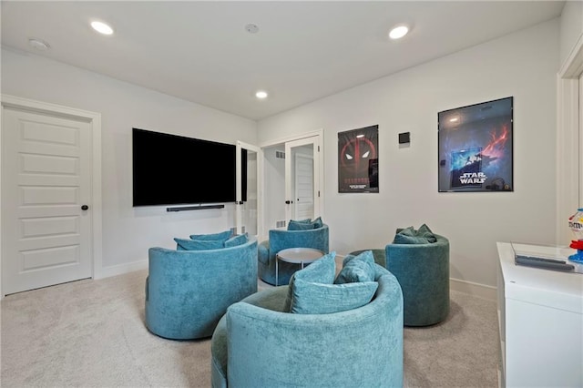 12313 W 169th St, Overland Park, KS 66221 - home theater room featuring light colored carpet and recessed lighting