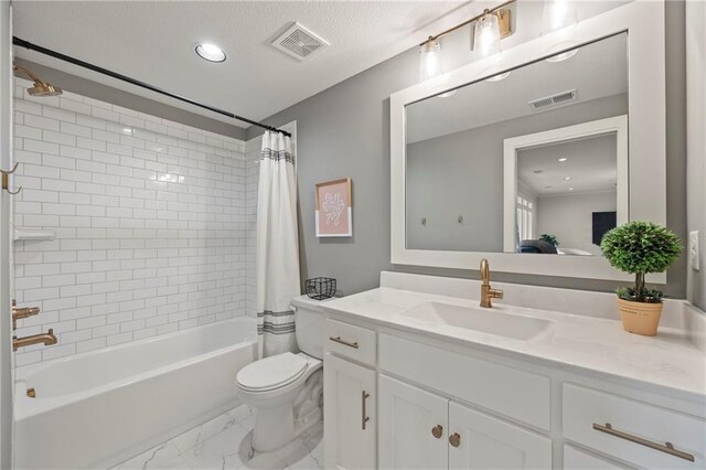 12313 W 169th St, Overland Park, KS 66221 - full bathroom featuring vanity, shower / tub combo, marble finish floors, and recessed lighting
