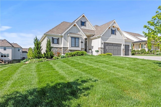 12313 W 169th St, Overland Park, KS 66221 - craftsman-style house featuring board and batten siding, stone siding, concrete driveway, and a front lawn