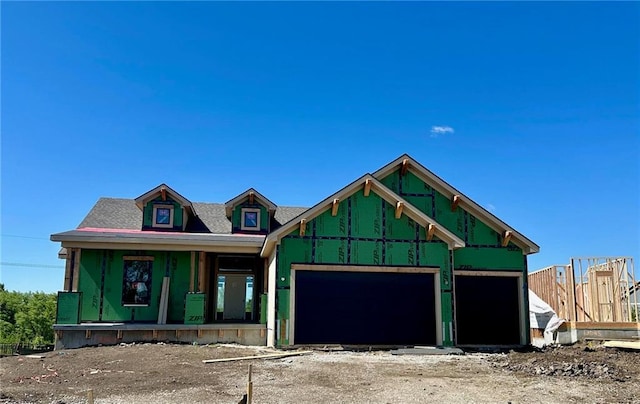 13021 W 174th Pl, Overland Park, KS 66221 - property under construction with covered porch, a garage, and roof with shingles