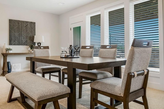 13021 W 174th Pl, Overland Park, KS 66221 - dining area featuring light carpet and plenty of natural light