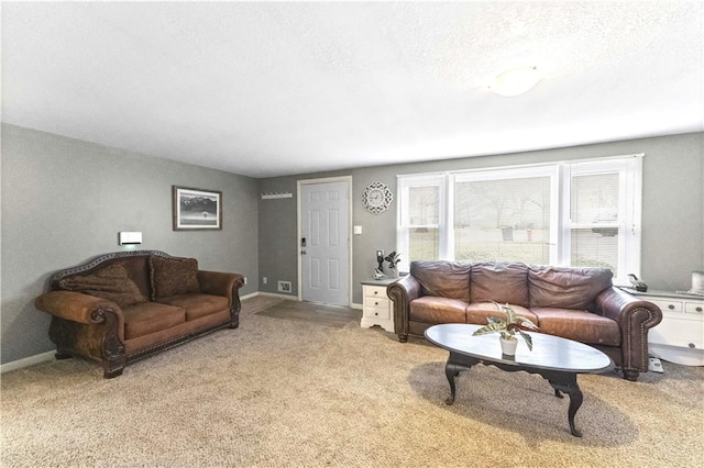607 SW 8th St, Blue Springs, MO 64015 - living area featuring light colored carpet, a textured ceiling, and baseboards
