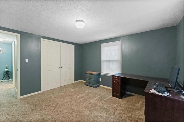 607 SW 8th St, Blue Springs, MO 64015 - office area featuring carpet flooring, baseboards, and a textured ceiling