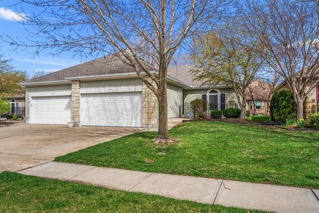 ranch-style house featuring stucco siding, an attached garage, concrete driveway, and a front yard