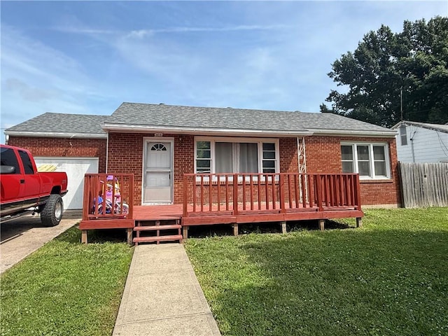 611 E Elm St, Hardin, MO 64035 - view of front of property featuring brick siding, roof with shingles, and a garage