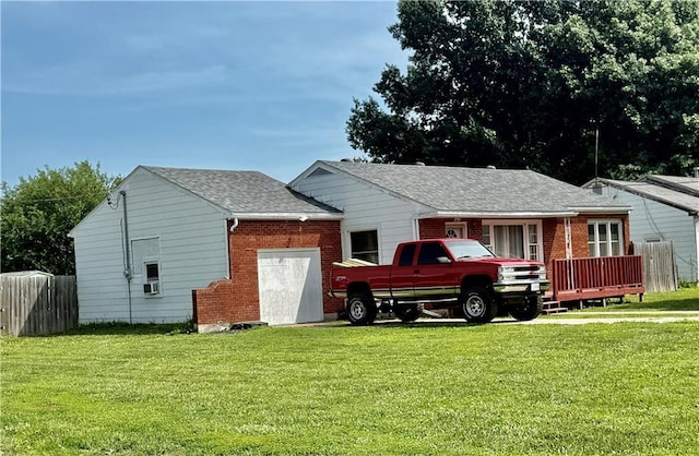 611 E Elm St, Hardin, MO 64035 - view of front facade featuring brick siding, a deck, and a shingled roof