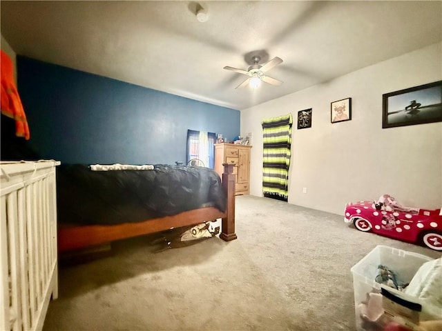 611 E Elm St, Hardin, MO 64035 - bedroom with carpet and a ceiling fan