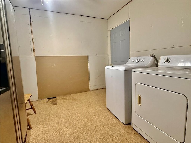 611 E Elm St, Hardin, MO 64035 - laundry area with separate washer and dryer