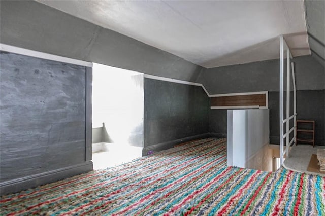 additional living space with lofted ceiling