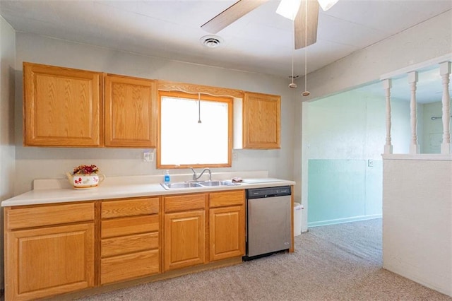 kitchen featuring light countertops, visible vents, light carpet, a sink, and stainless steel dishwasher